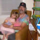 My daughter with our friend, Jack Powers, who founded Stone Soup Poetry in the Boston area