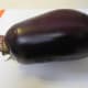 One large globe-shaped eggplant