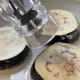 Put the coated side of eggplant into a pan with several tablespoons of the olive oil and season the uncoated side with the salt and pepper.