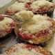 Coat with the Romano and then the Parmesan cheeses.