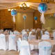 Like white bag-style covers, stretch covers can be adorned with a touch of color to match your theme.