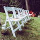 Renting new chairs often doesn't cost much more than renting or buying chair covers, but you'll need to pay for delivery or a U-Haul and setup.