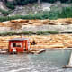 We start seeing more timber being floated in the water.