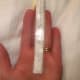 Measure from the second lateral line up to the top of the ring finger. Note the number of inches to the 1/8".