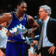 Karl Malone discussing matters with Utah Jazz coach.