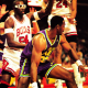 Karl Malone struggles against Chicago Bull's tight defense.