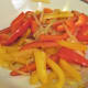 Remove the cooked onions and peppers to a dish