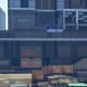 Keep and eye on the rooftop of this building for snipers (blue circle).