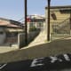 As you escape down the alley go right, across from the entrance to the parking garage, and climb the wall at the third telephone pole.