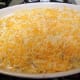 Top with the full cup of grated cheese.