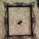 Start with an old picture frame and thread.