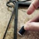 Knot your thread in the middle of the first leg of your H. Wrap the thread over and under the other leg to complete your letter.