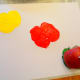 Press apple stamps firmly onto paper.