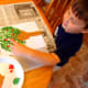 Make apples using red paint and your child's fingerprints.