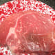 Trim fat from steak.