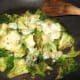 When cheese melts, serve broccoli with steak.