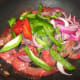 Add peppers and onions.