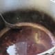 Deglaze the pan with red wine
