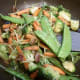 Add vegetables and chicken to sauce and heat. Serve with rice or noodles on the side.