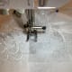 Sew near the original hem as close as possible. For sheer or loosely woven fabric sew another row 1/4 from the first stitching.