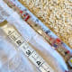 Notice the 56 inch mark on the tape measure. This is where I need the bottom of the original hem to hit. It is at about the 51 3/4 mark in this photo, for reference.