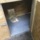 I installed a lock on the outside. I first used a barrel-bolt lock but a raccoon was able to open it so I switched to an actual lock that requires a key and kept the key in the storage cabinet.