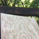 I bought sheets of plywood for an "A" shaped roof. It was big enough it didn't require cutting. Here I was lining it up but was taking pictures at the same time so it wasn't flat.