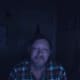 At night with only monitor providing light