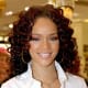 rihanna always shows some different style with her short curly hairstyles