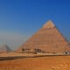 Although many Egyptian pyramids are formed of cut stone as pictured, some others were made of sun-hardened adobe-like bricks made with straw, as seen in the film The Ten Commandments.