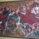 Fresco of a man gathering saffron