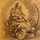 The Virgin Mary sitting upon the cresent moon, nursing the infant Jesus