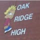 Add a funny sign or graphic to the school building by the school's name.