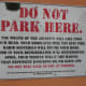 A very eloquent no parking sign.