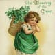 Vintage cute kids: Little girl dressed in green and carrying a basket of shamrocks "The wearing of the green"