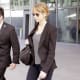 Jennifer Lawrence at the airport in skinny jeans and high heels