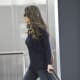 Elizabeth Hurley leaving the airport wearing dark denim and sky high heels
