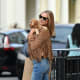 Kimberley Garner has a perfect body for skinny jeans wearing a fringd jacket and sexy booties
