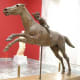 Late Hellenistic bronze statue, c. 140 BCE. The dynamic pose and the strain depicted in both figures is typical of Hellenistic art, which shifted from ideal and austere to gritty realism and the (melo)dramatic.