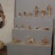 Small fired clay votives -- art offered by devotees -- found near shaft graves at Mycenae.