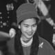 Queen SiriKit (as a young woman - Queen of Thailand) wearing a multi-strand pearl necklace in a black and white photo
