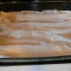 #7- Once you layer the fillo, brush or spoon the melted butter over the layered fillo. I try to make sure all of the fillo has some butter on it.