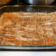 #8- Continue to layer the nuts, fillo. and butter.