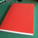 Stitch the plastic cover to the book.