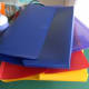 Plastic folders to be recycled into book covers.
