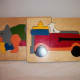 Small wood connecting puzzles. Rhino and baby, and fire engine with fire dog.