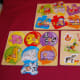 Non-connecting puzzles with knobs. Six-piece puzzles with large knobs, and nine-piece farm animals puzzle with small knobs.