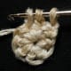 IN FORMING A TATTED LOOP: Insert hook in next sc and draw a loop through.