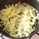 Sauteeing the onions for bhuna sauce