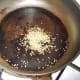 Toasting the mustard and cumin seeds